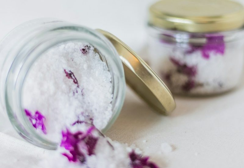white salt on glass jar
